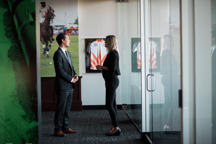 SkyView Partners employees talking in hallway